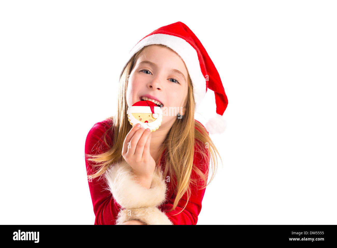 Christmas Santa eating cookie and Xmas blond kid girl isolated on white background Stock Photo