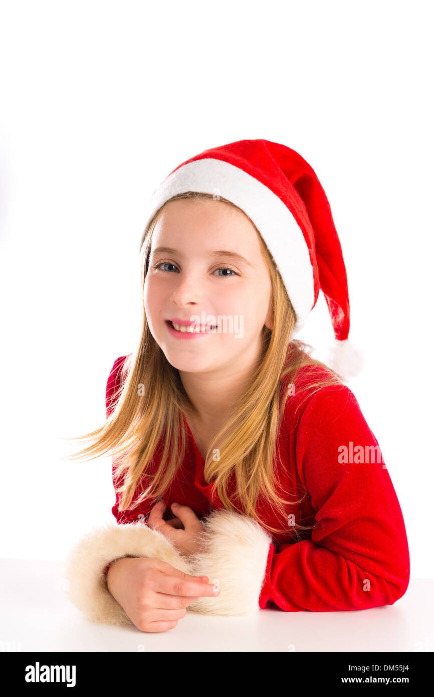 Christmas Santa blond kid girl smiling happy isolated on white Stock Photo