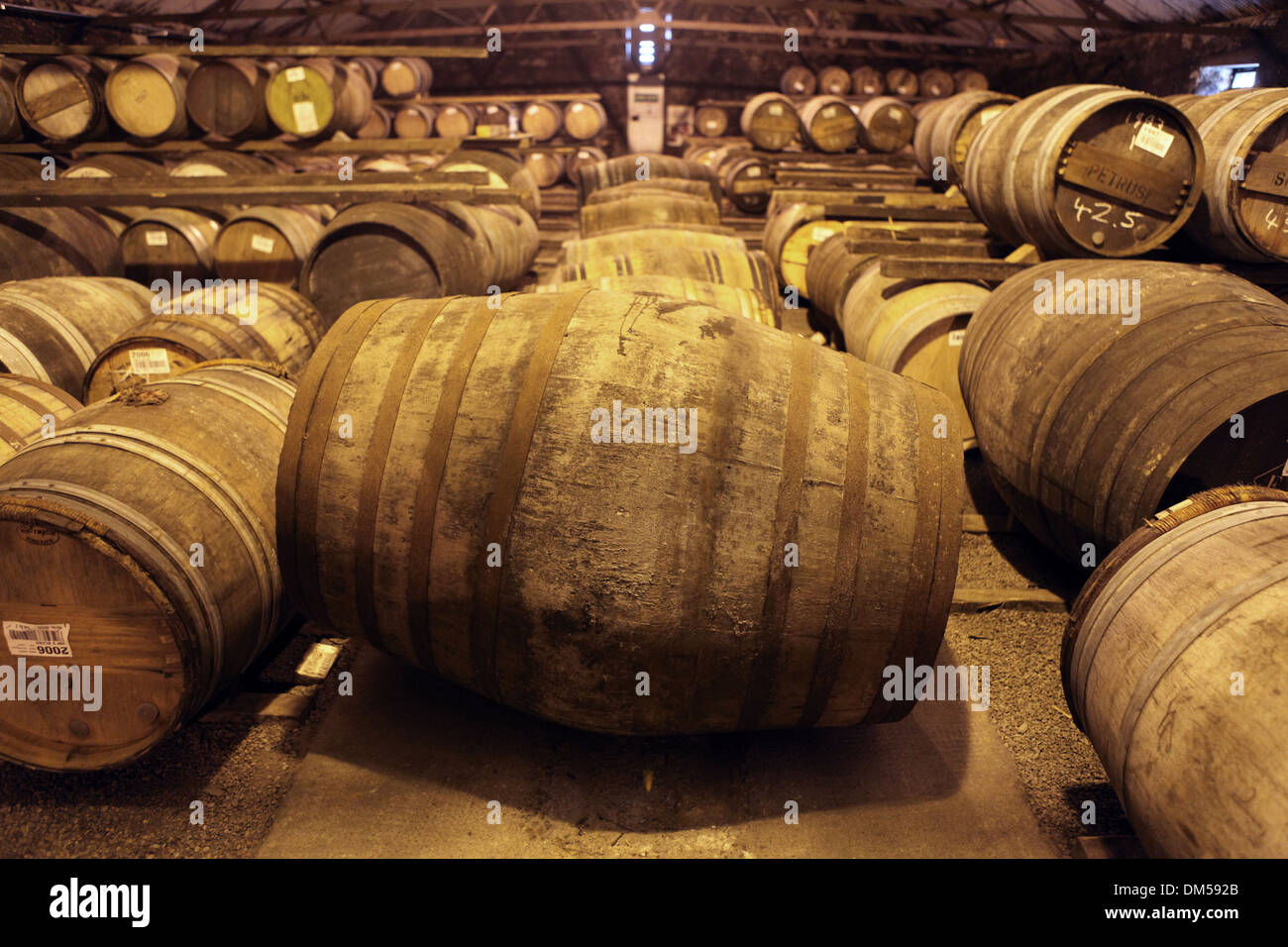 Oak casks at the Bruichladdich Distillery on the isle of Islay Stock