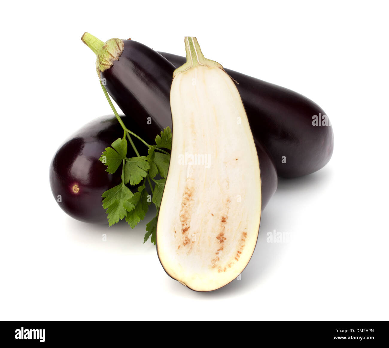 eggplant or aubergine and parsley leaf on white background Stock Photo
