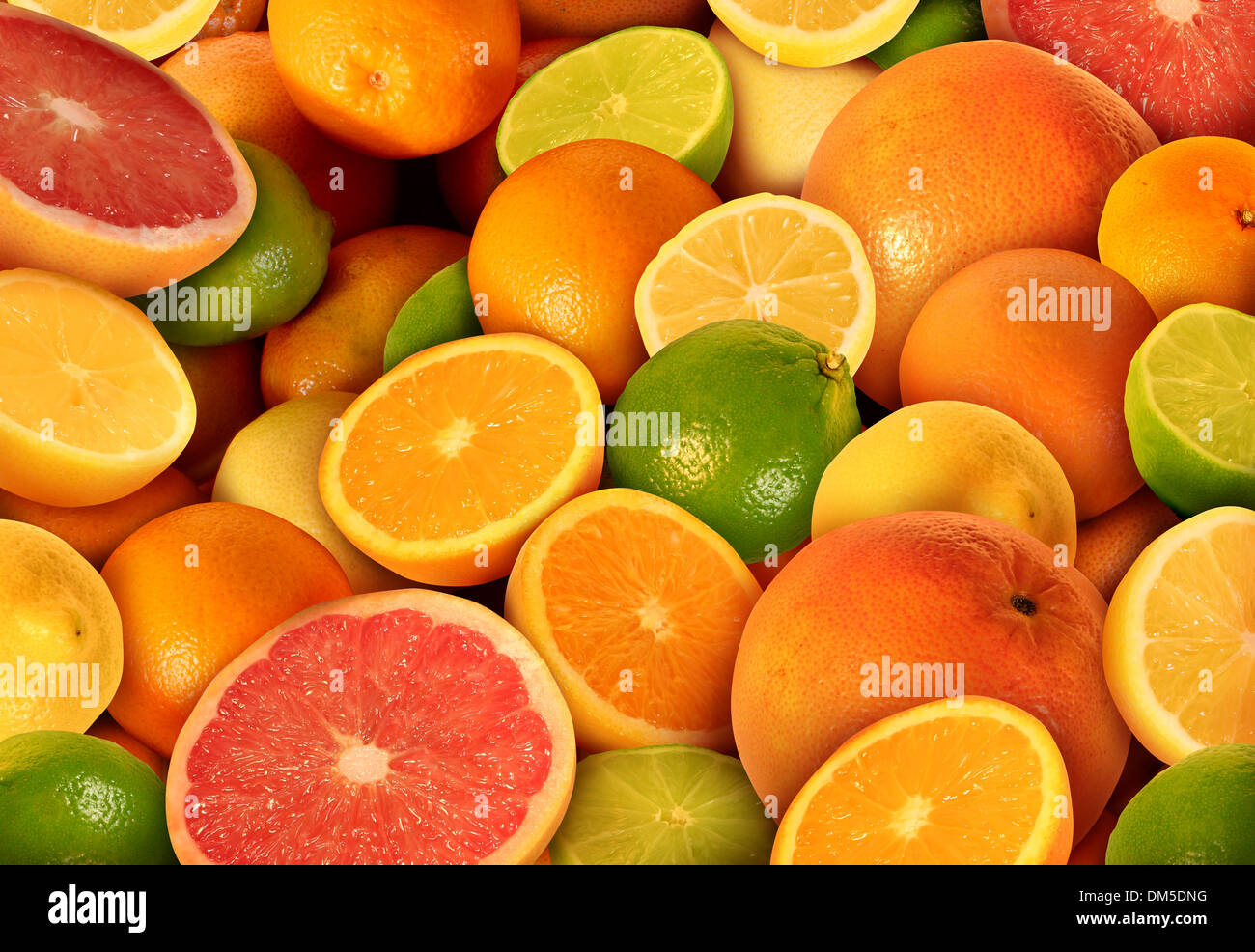 Citrus fruit background with a group of cultivated and harvested oranges lemons lime pomelo