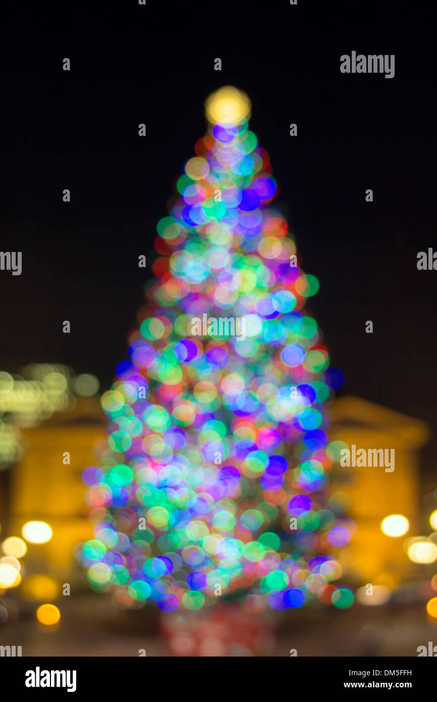 Christmas Holiday Tree at Pioneer Courthouse Square in Portland Oregon Downtown Blurred Defocused Bokeh Colorful Lights at Night Stock Photo