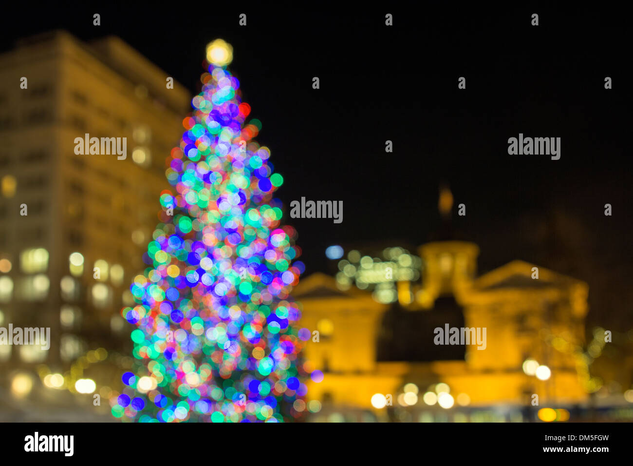 Christmas Holiday Tree with Festive Colorful Out of Focus Bokeh Lights  in Pioneer Courthouse Square Stock Photo