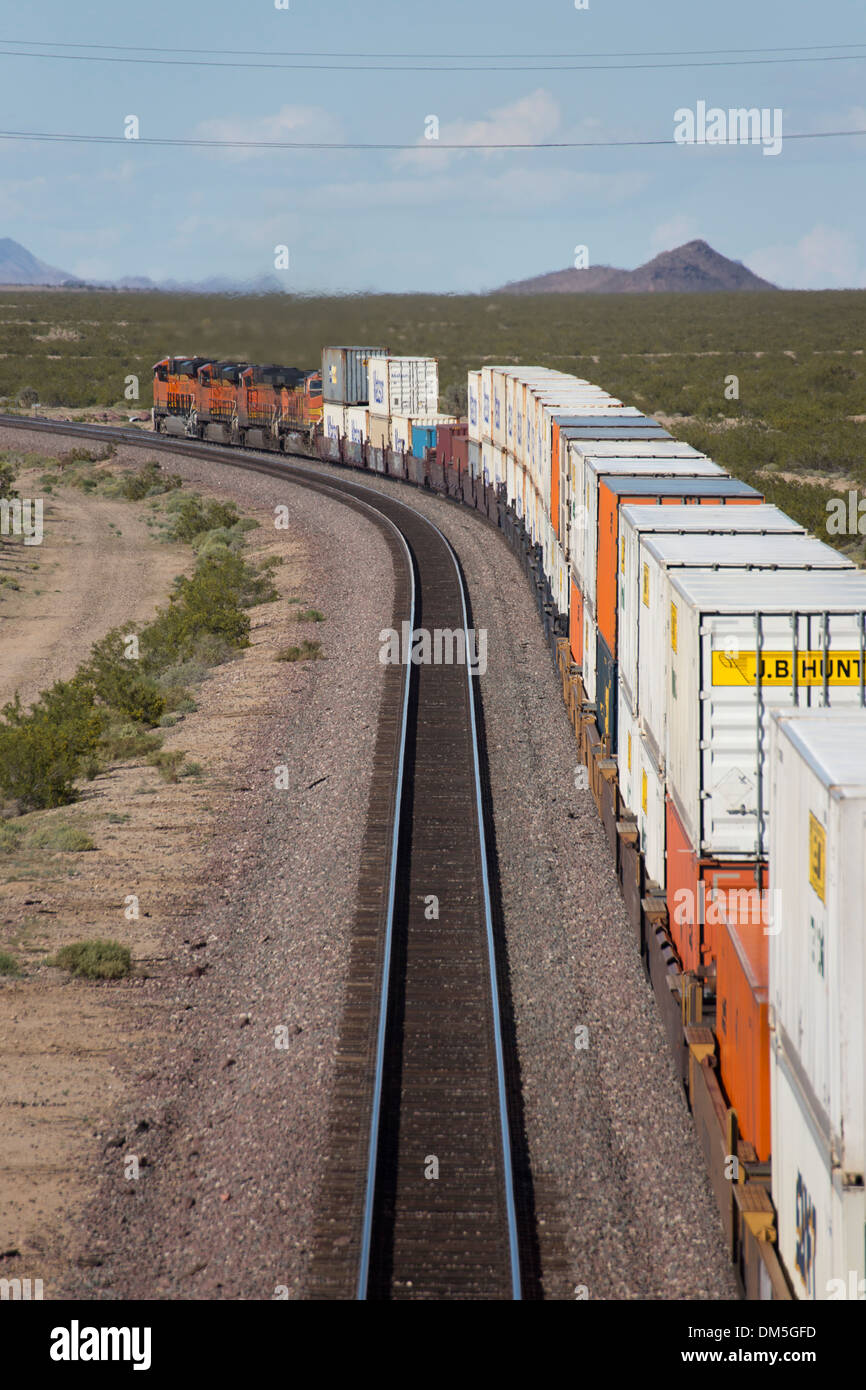 Freight Train crossing the California Desert Stock Photo