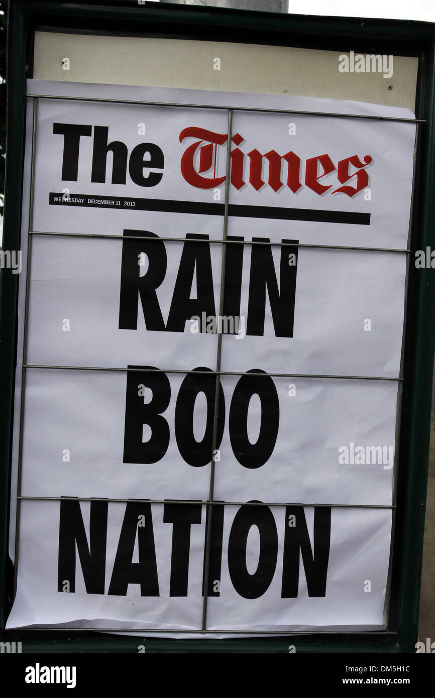 Durban, South Africa. 11th Dec, 2013. While the South Africa's national broadcaster limited any reference to the country's president Jacob Zuma being booed in front of world leaders at Nelson Mandela's memorial, print media did not and reported extensively on it. This newspaper poster played on the popular phrase that South Africa with all its different races is a rainbow nation. Picture:Giordano Stolley/Alamy Live News Stock Photo