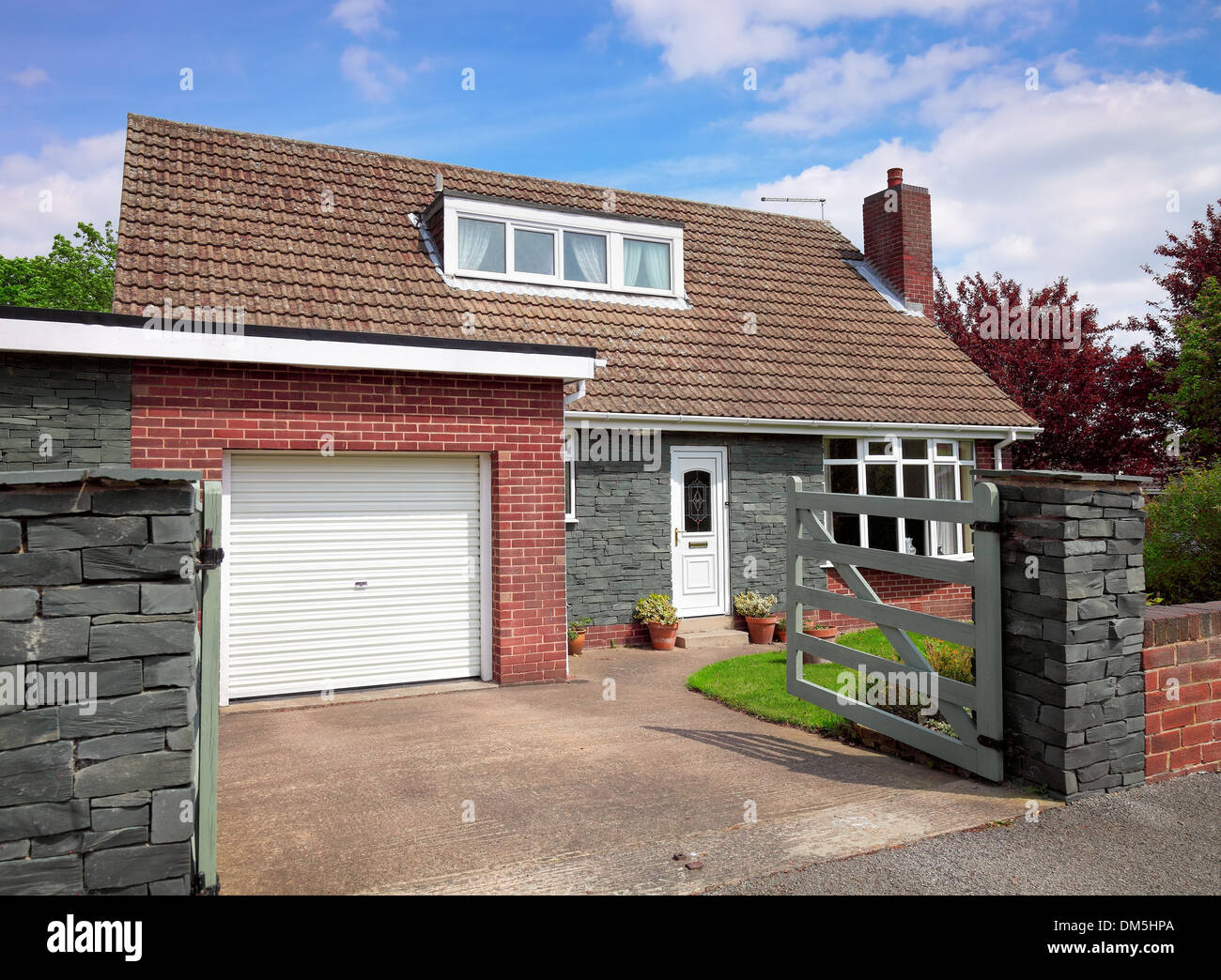English house with garage Stock Photo Alamy