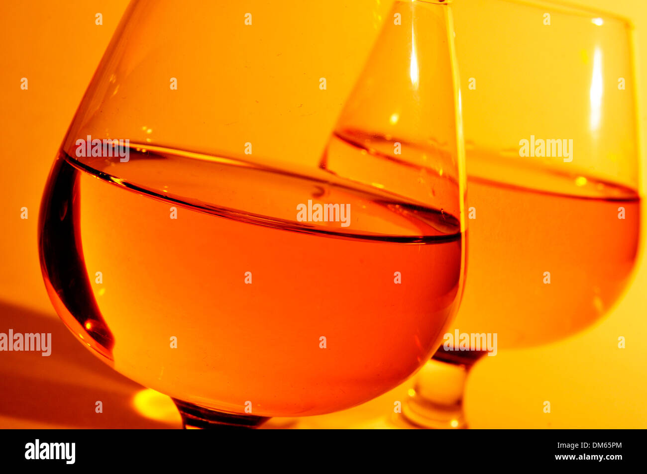 closeup of some cognac glasses with brandy Stock Photo