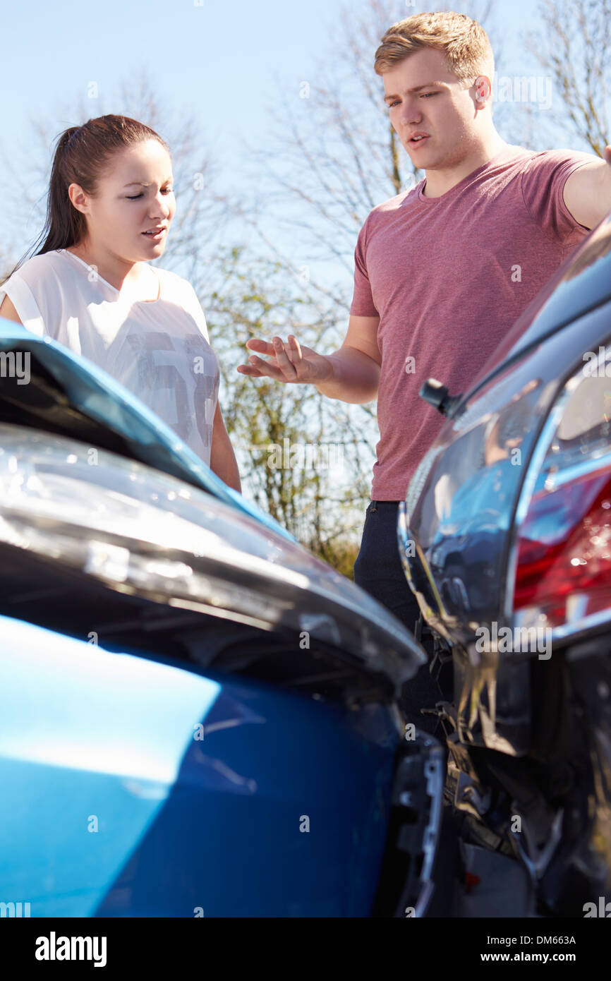 Driver Inspecting Damage After Traffic Accident Stock Photo