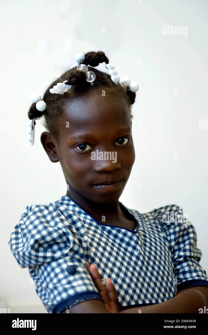 Girl with pigtails, Port-au-Prince, Haiti Stock Photo