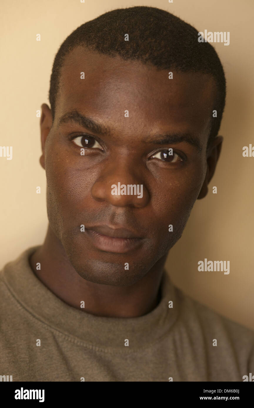 Serious african man looking camera hi-res stock photography and images ...