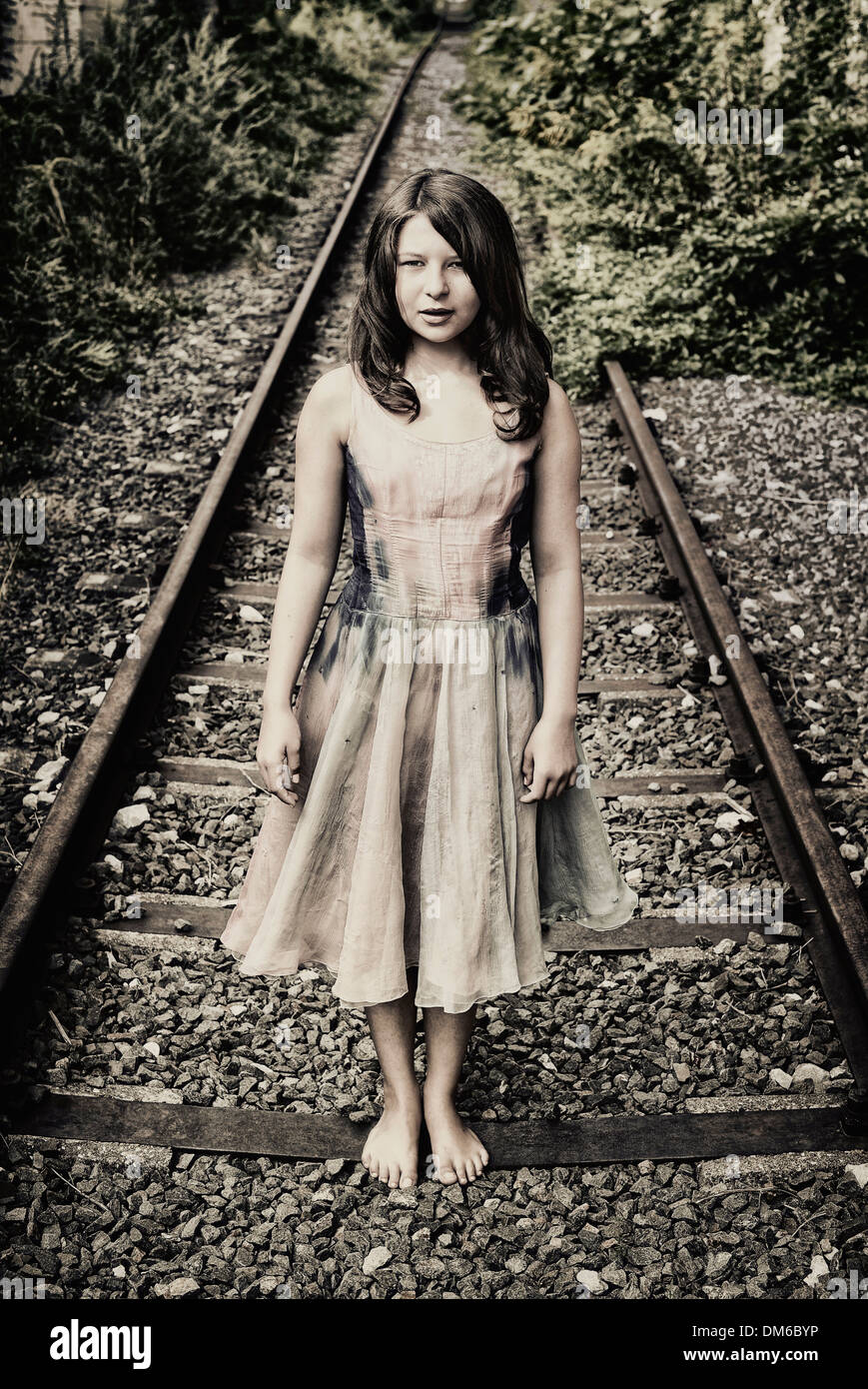 Girl standing on railroad track hires stock photography and images Alamy