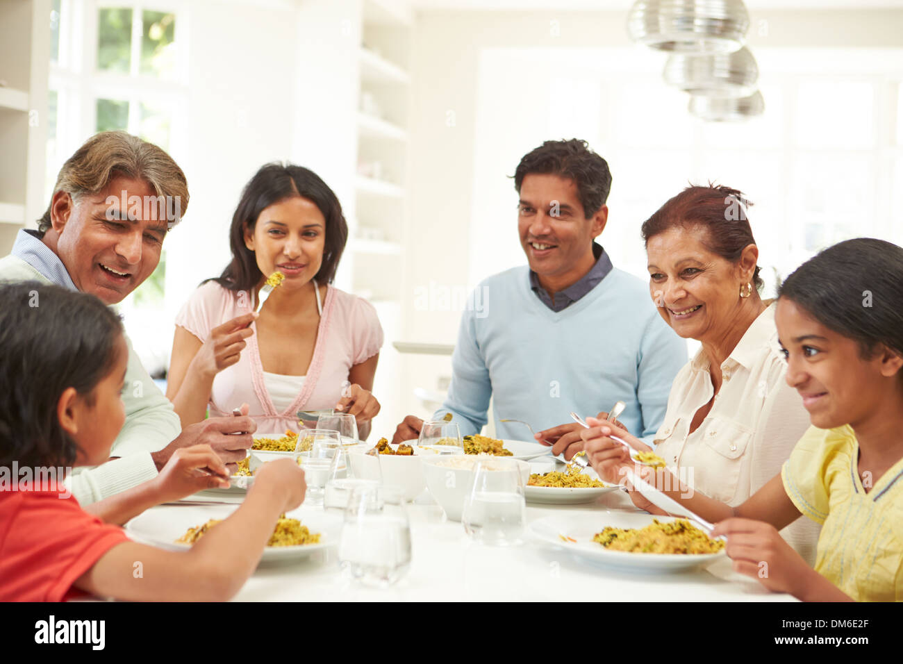 Indian family eating hi-res stock photography and images - Alamy