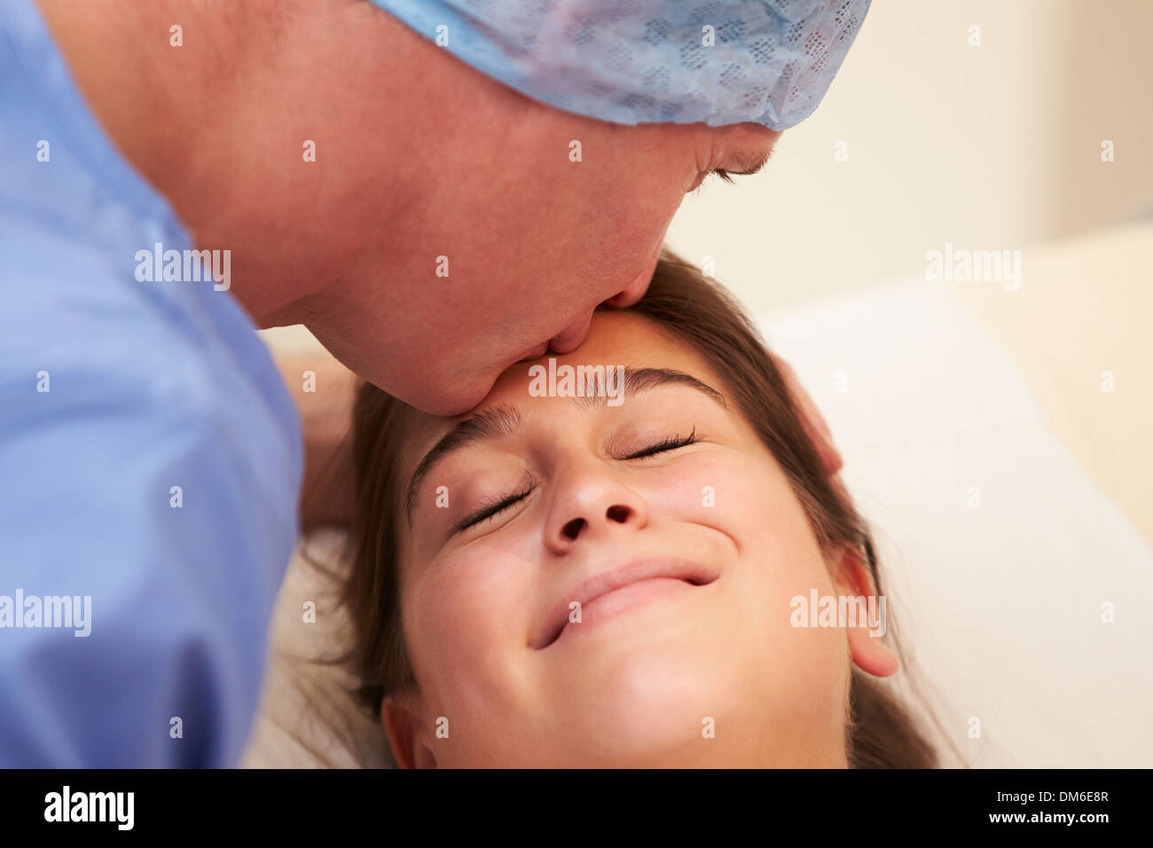 Husband Supporting Wife Through IVF Treatment Stock Photo
