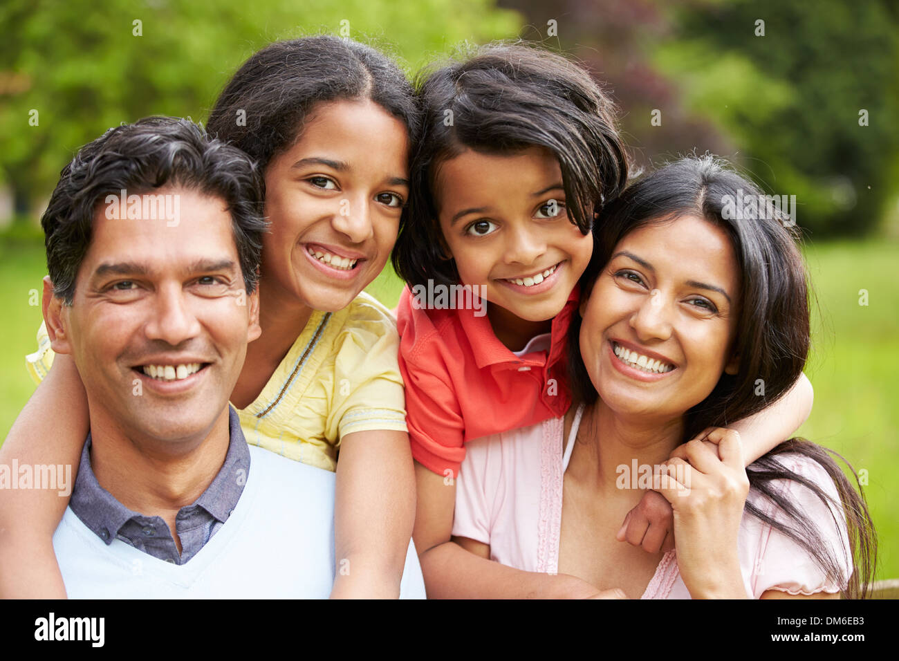 Indian Family Walking In Countryside Stock Photo - Alamy