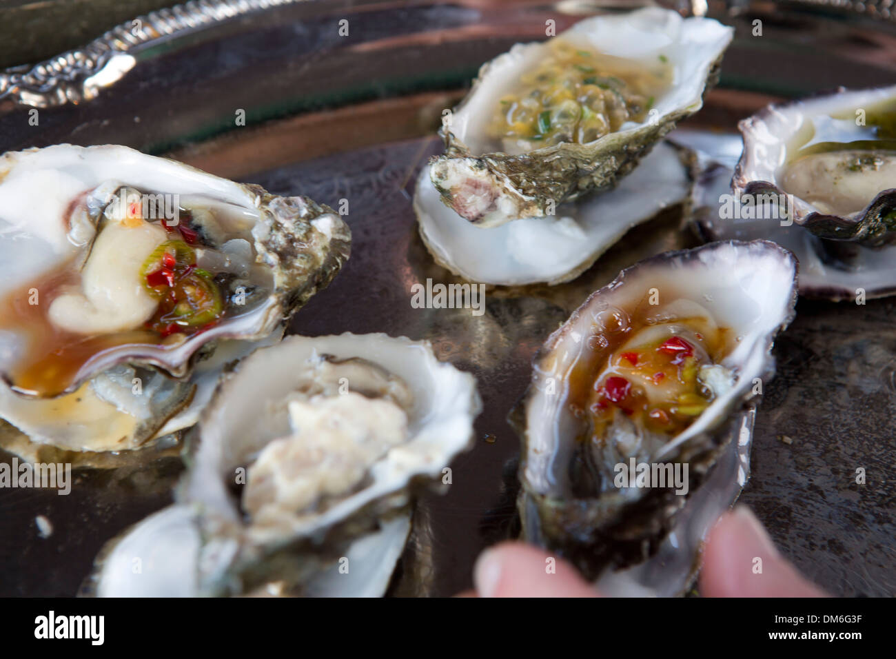 Grilled sausages on a food cart grill