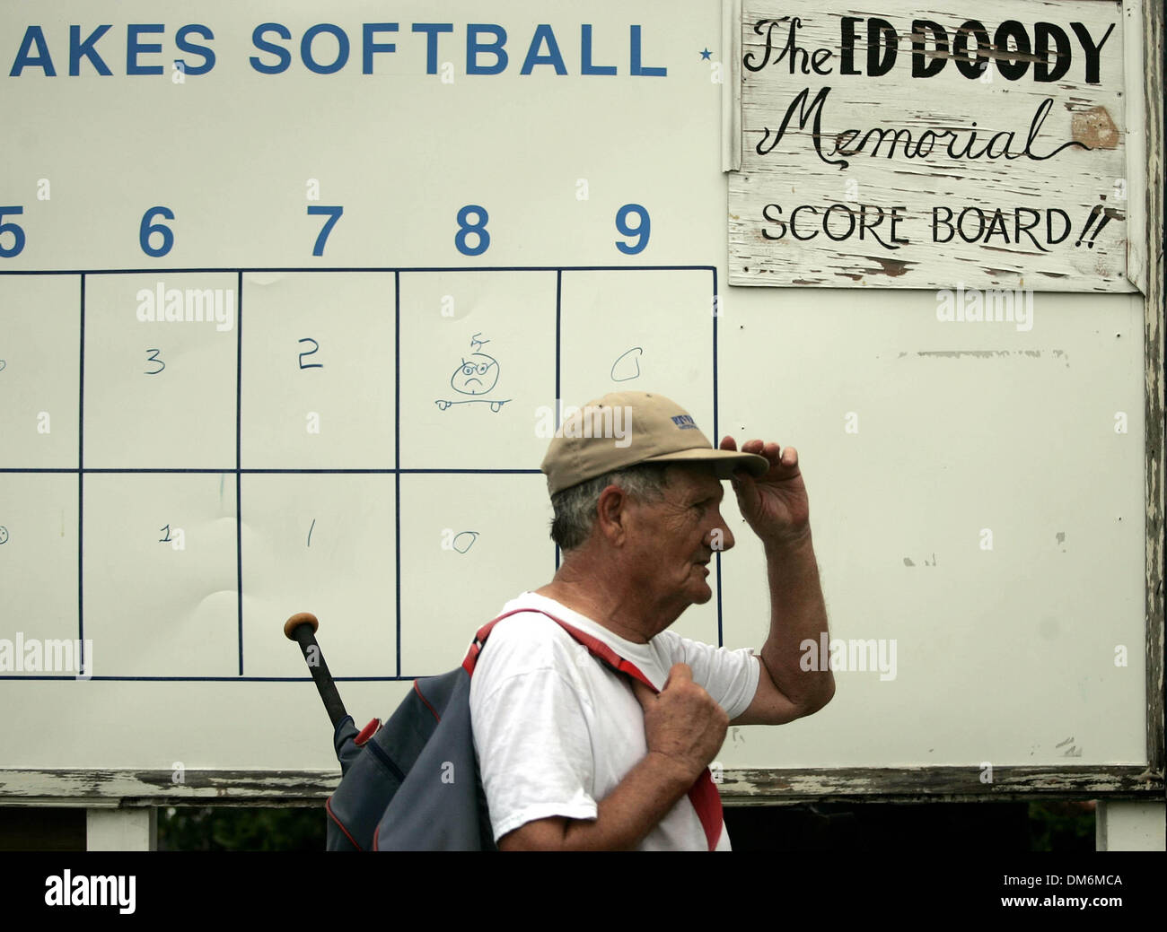 Jun 03, 2005; Port St. Lucie, FL, USA; BILL SIDES, 75, of Port St. Lucie tips his hat in memory of Ed Doody after the Spanish Lakes Softball League finished practicing Friday morning in Port St. Lucie. 'He was the first one here and the last one to leave,' Sides said. 'He was our man; we miss him every day.' The group plays softball twice a week.  Mandatory Credit: Photo by Libby V Stock Photo