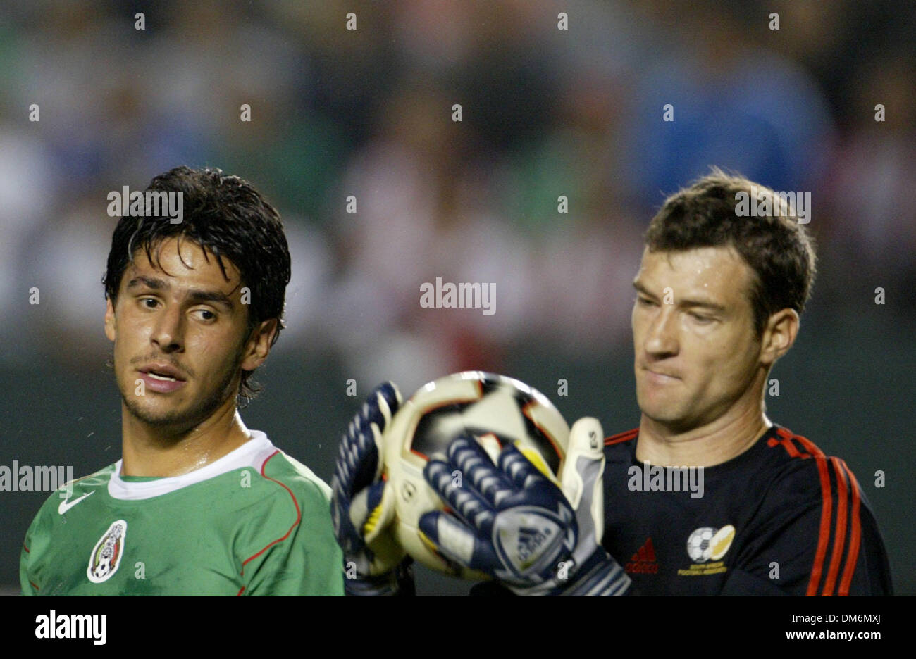 Jul 08, 2005; Carson, CA, USA;  Rafael Marquez Lugo of Mexico (L) looks over (1) Golie Calvin Marlin  of South Africa as he stops  a shot on goal during the second half of their Confederation of North, Central American and Caribbean Association Football (CONCACAF) Gold Cup soccer match in Carson, California July 8, 2005 South Africa won the game 2 to 1 Mandatory Credit: Photo by Ar Stock Photo