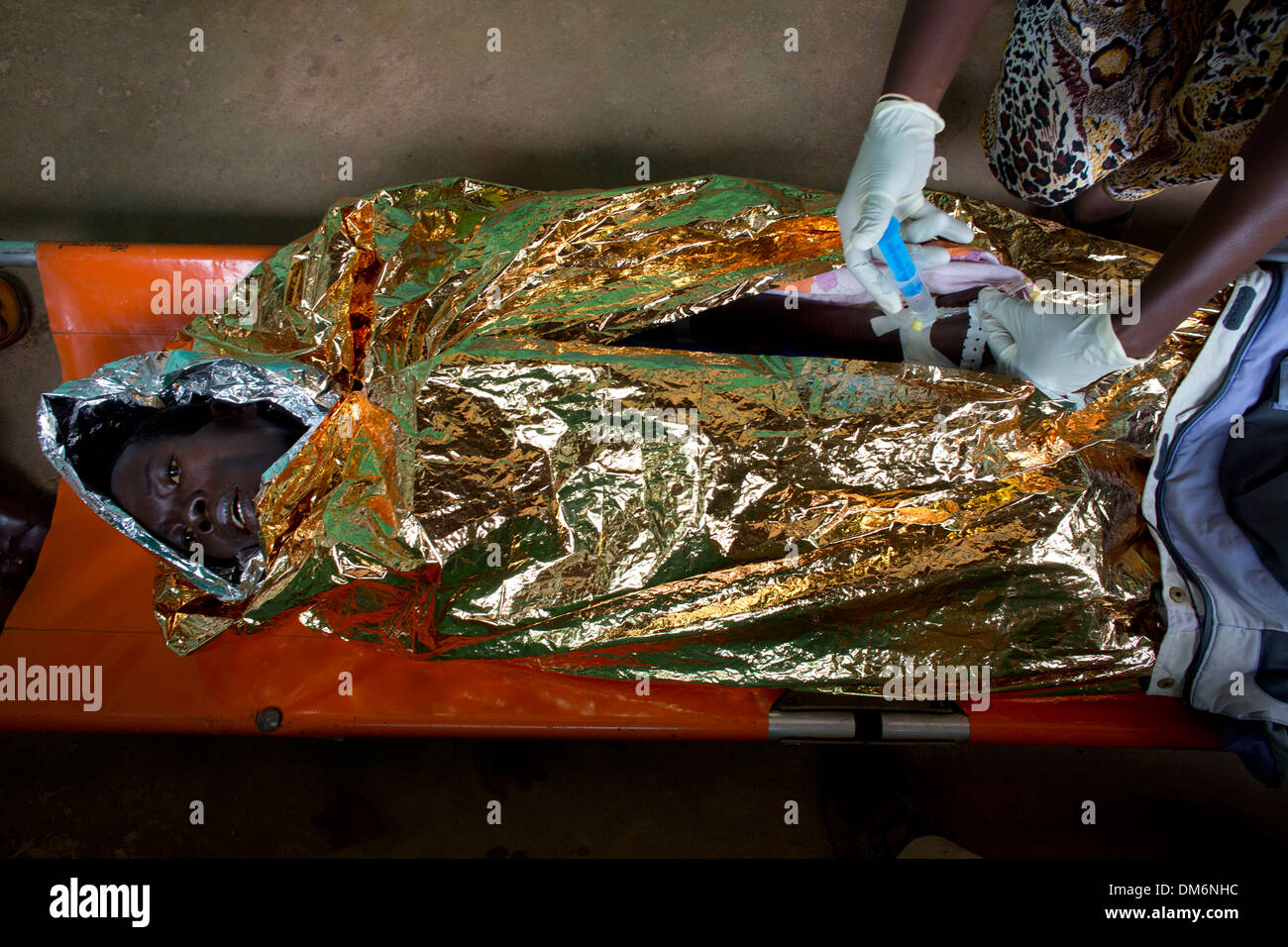 HIV aids patient wrapped in alluminium foil to keep warm in hospital in ...