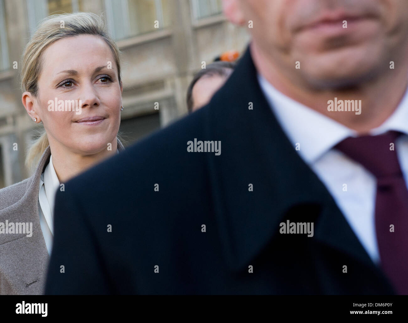 Hanover, Germany. 12th Dec, 2013. Bettina Wulff leaves the regional court in Hanover, Germany, 12 December 2013. Her husband, former German President Wulff is on trial for accepting favours. Bettina was called to give testimony. Photo: JULIAN STRATENSCHULTE/dpa/Alamy Live News Stock Photo