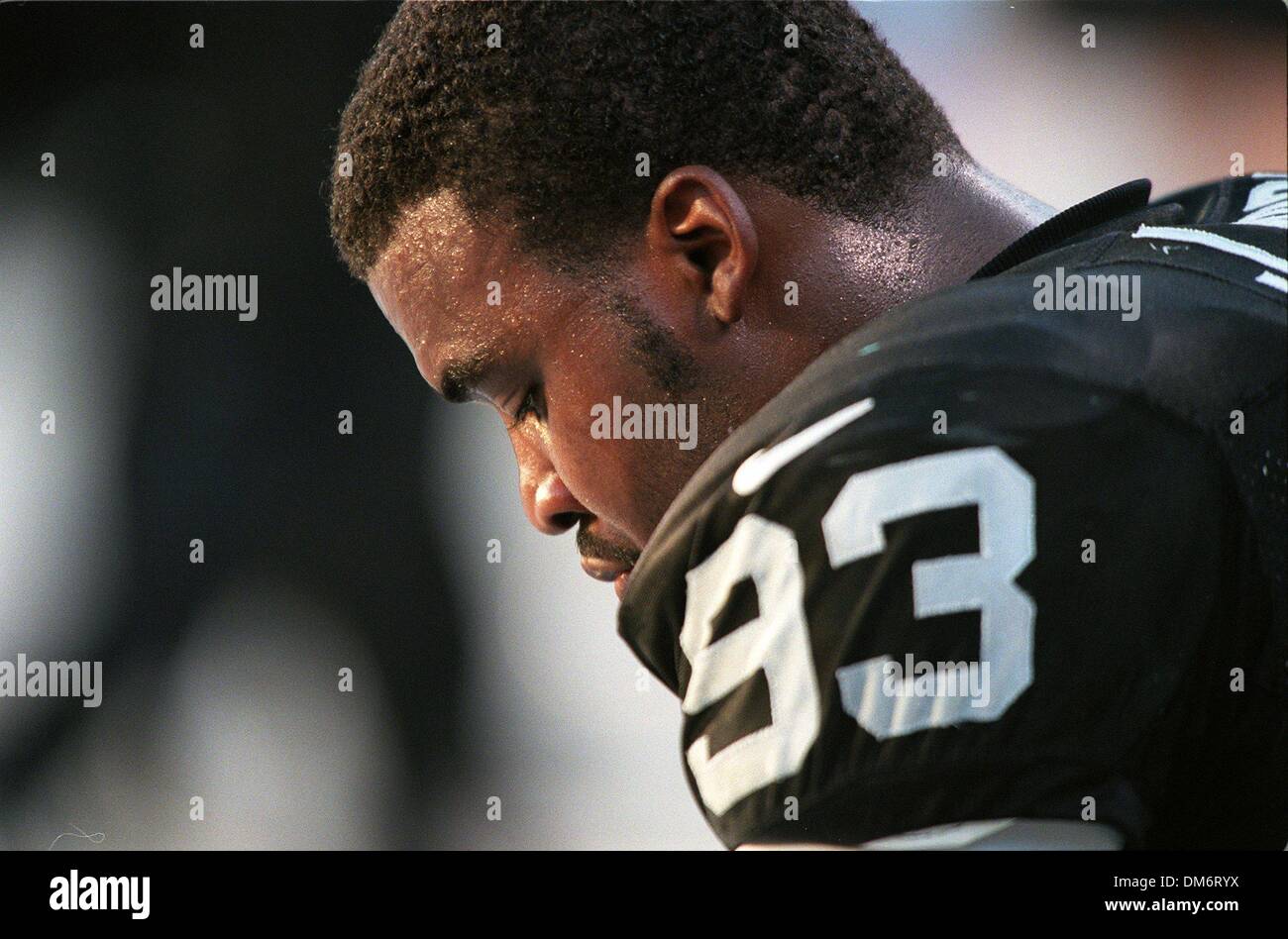 Oakland Raiders defensive end James Harris(93) sits dejected on the