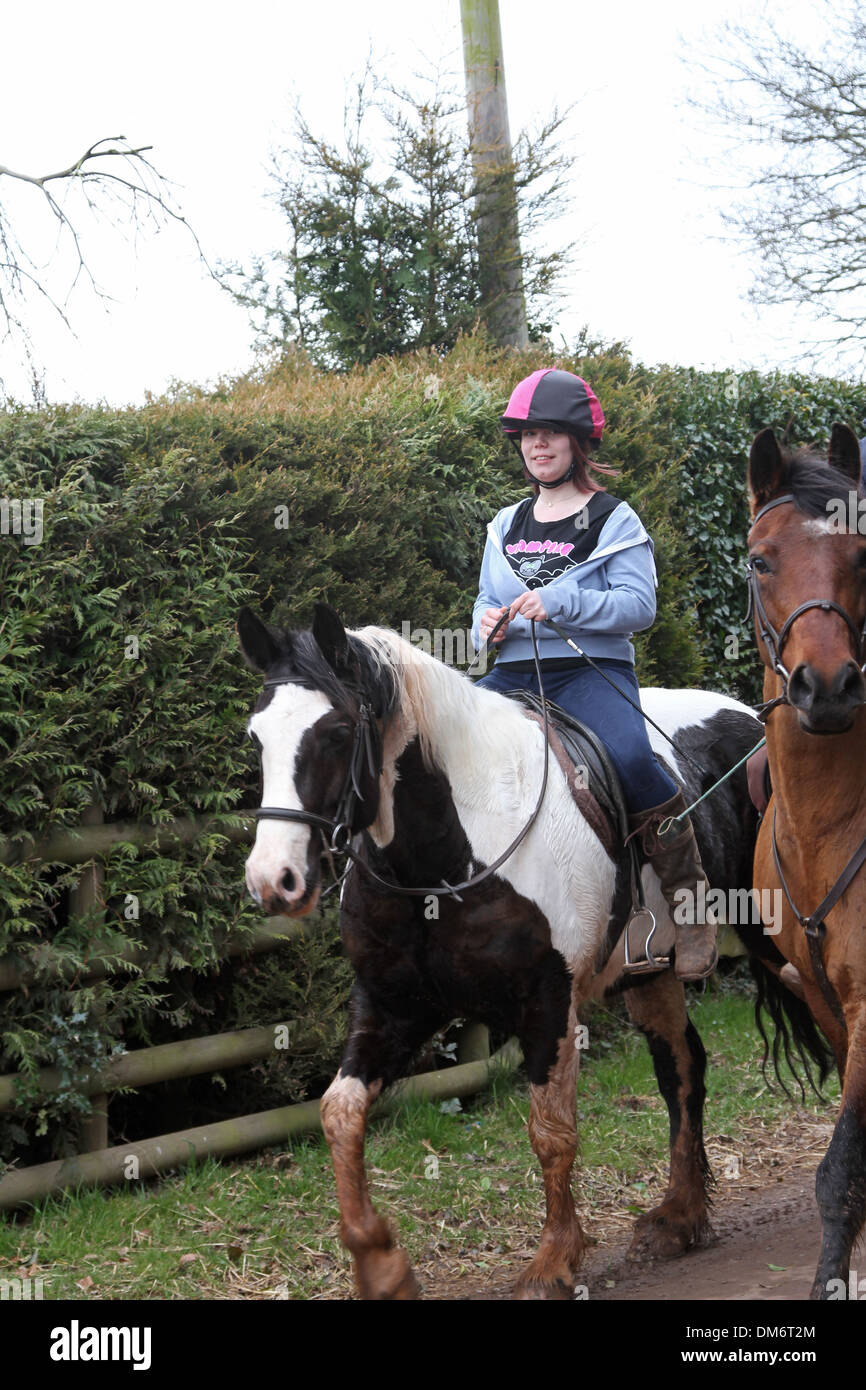 Horses and riders hacking out Stock Photo - Alamy