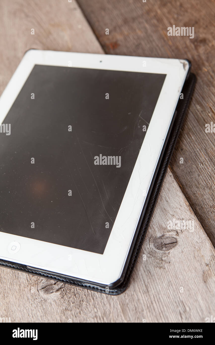 Tablet pc with small cracks on the screen Stock Photo