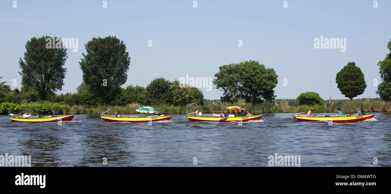 small boats in Amsterdam canal Stock Photo Alamy