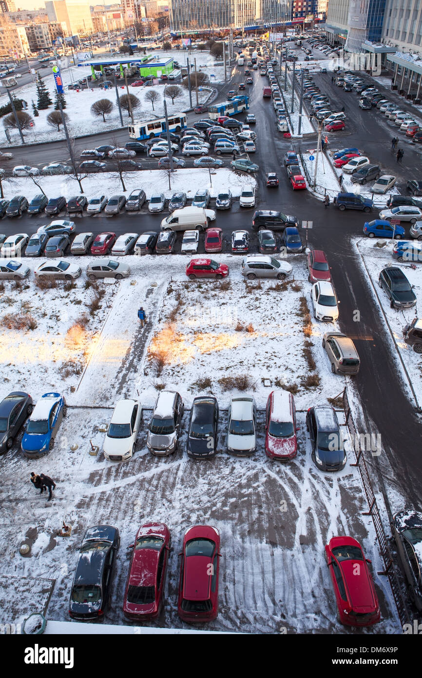 The grounds in front of the business center with parked cars on circa Dec, 2013 in Saint-Petersburg, Russia. Parking problem Stock Photo