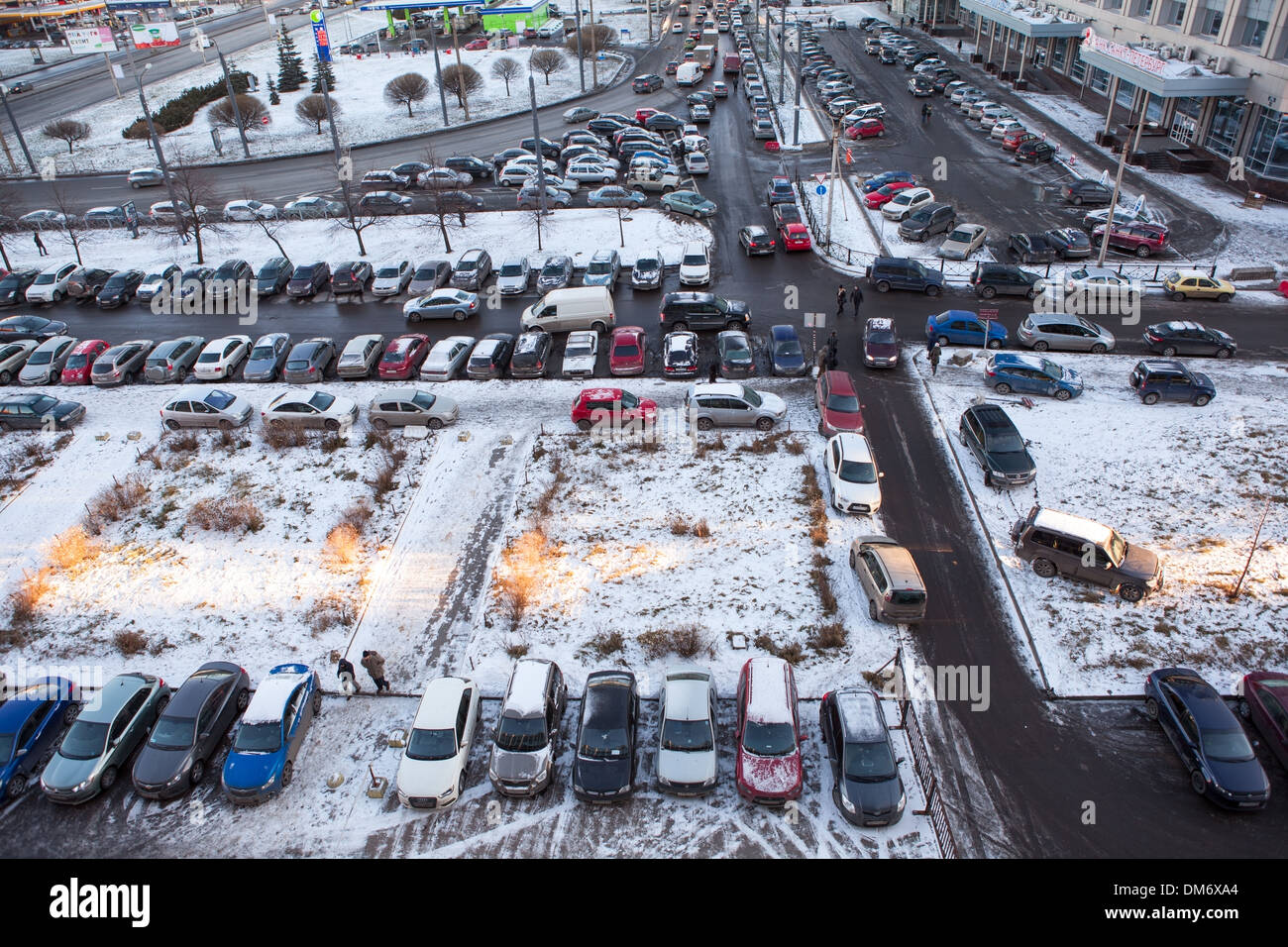 The grounds in front of the business center with parked cars on circa Dec, 2013 in Saint-Petersburg, Russia. Parking problem Stock Photo