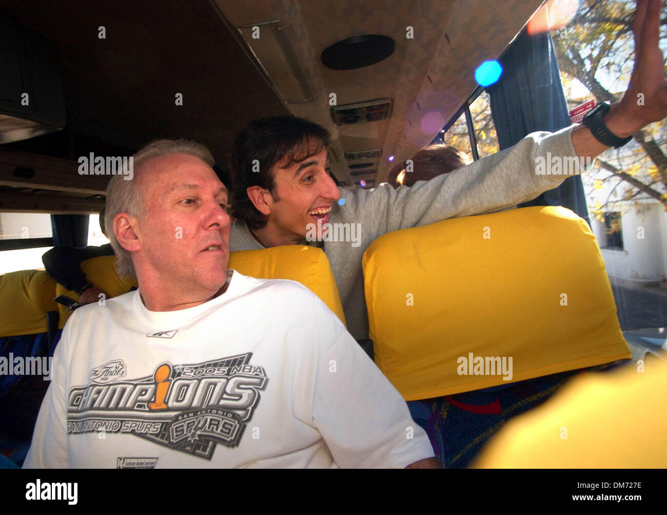 Jul 04, 2005; Bahia Blanca, Argentina;  MANU GINOBILI waves to an aunt he spotted in the crowd as his bus drives through Bahia Blanca, Arg., his hometown, after arriving Monday, July 4, 2005. At left is Spurs Coach Gregg Popovich. Mandatory Credit: Photo by Bob Owen/San Antonio Express/ZUMA Press. (©) Copyright 2005 by Bob Owen/San Antonio Express Stock Photo