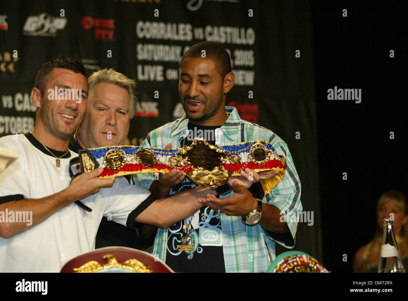 Jul 20, 2005; Las Vegas, NV, USA;  Former Jr Bantamweight Champion WAYNE MCCULLOUGH (L) and promoter GARY SHAW (C) presents DIEGO CORRALES with the most prestigous belt a fighter can receive, The Ring Magazine Belt. The Ring belt means that a fighter is the best in the World in his weight class.  The Ring Belt was presented at The 'Uno Mas' One More Time Press conference at Caesars Stock Photo