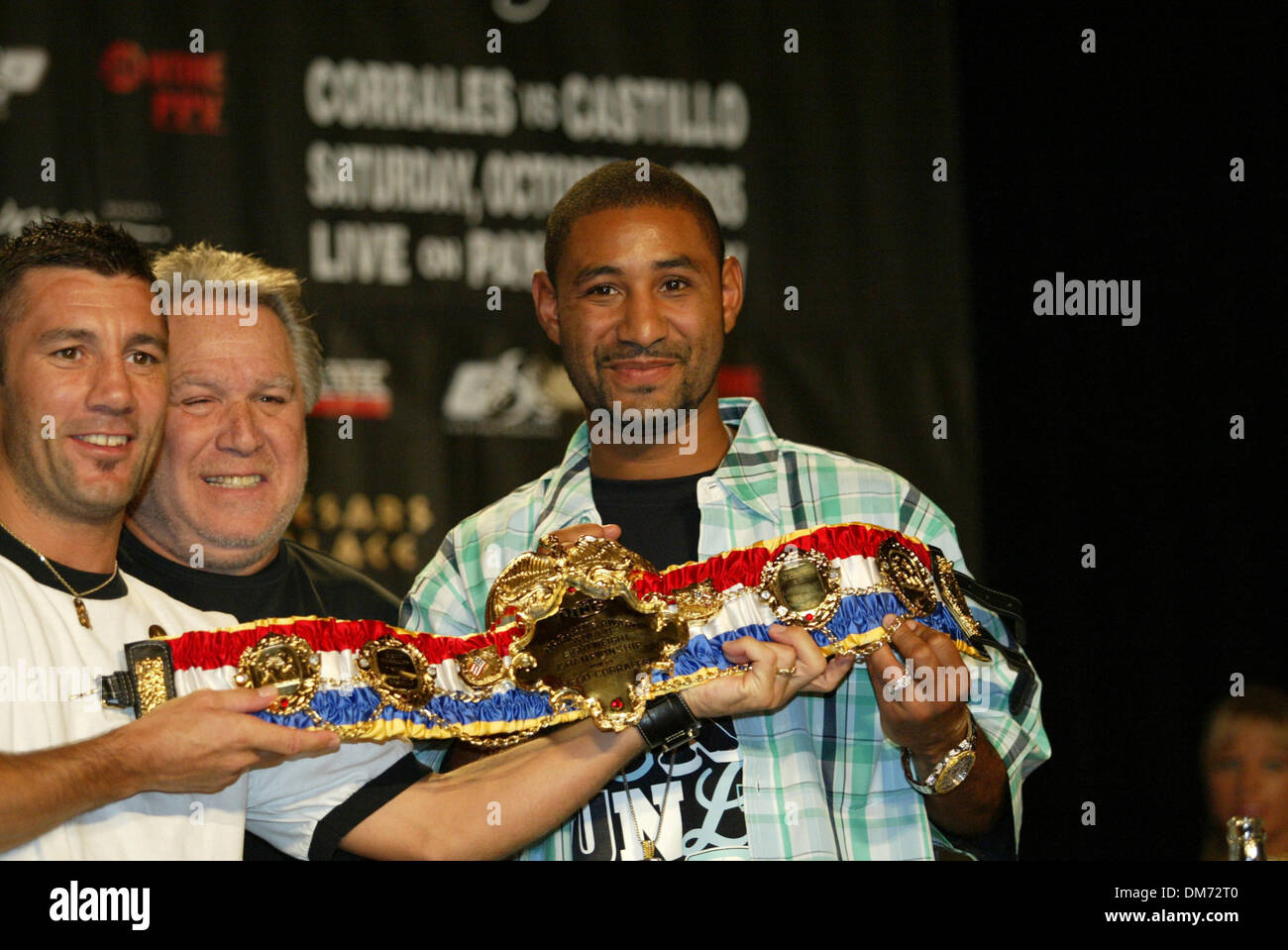 Jul 20, 2005; Las Vegas, NV, USA;  Former Jr Bantamweight Champion WAYNE MCCULLOUGH (L) and promoter GARY SHAW (C) presents DIEGO CORRALES with the most prestigous belt a fighter can receive, The Ring Magazine Belt. The Ring belt means that a fighter is the best in the World in his weight class.  The Ring Belt was presented at The 'Uno Mas' One More Time Press conference at Caesars Stock Photo