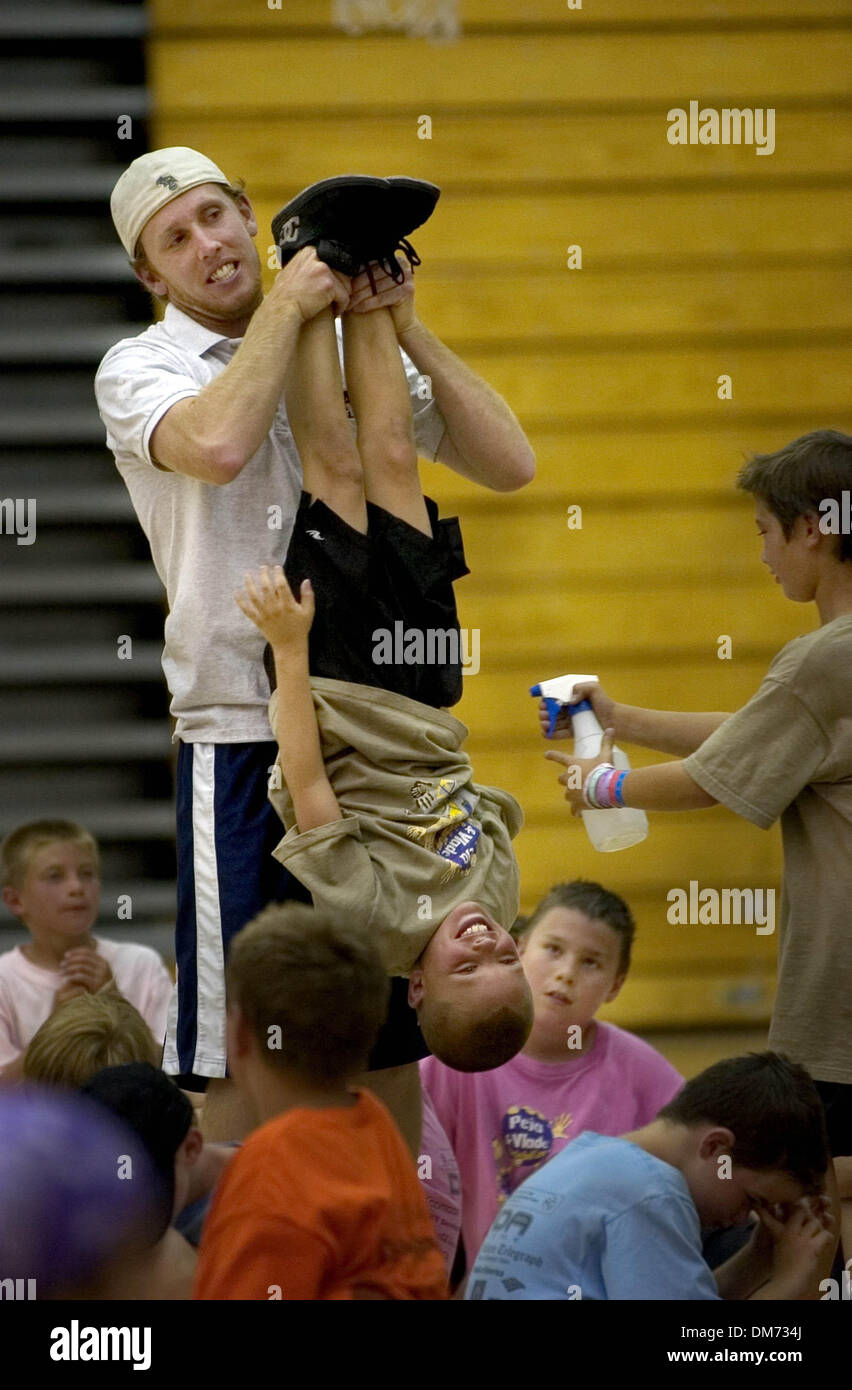 Jul 28, 2005; Hollywood, CA, USA; Camp coach Josh Wilcox, cq, gives Ben  From, 8, of Folsom a different look at the Folsom High School Gym during an  assembly at the Peja