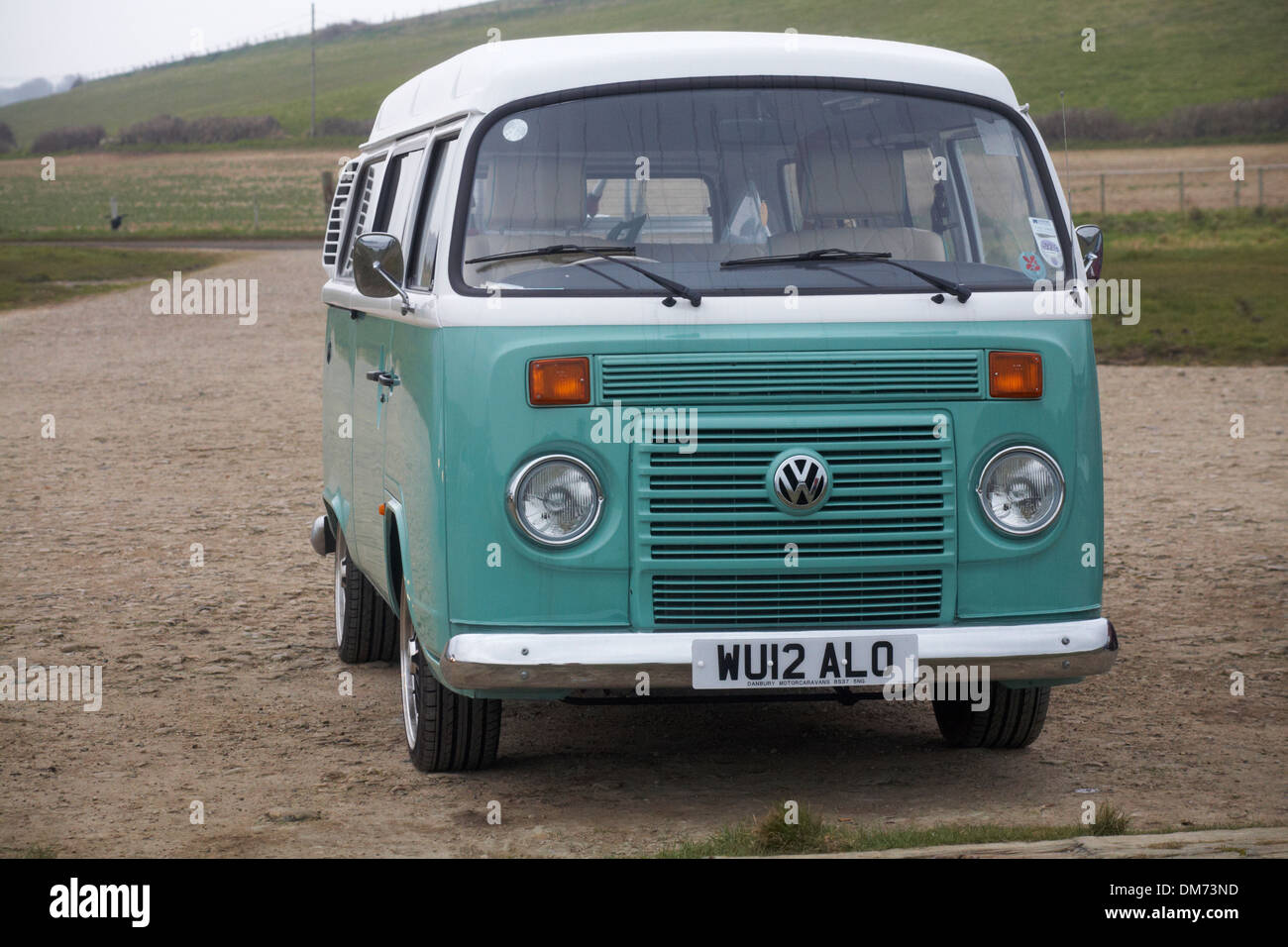 Volkswagen campervan VW campervan parked at Kimmeridge Bay, Dorset UK in February Stock Photo
