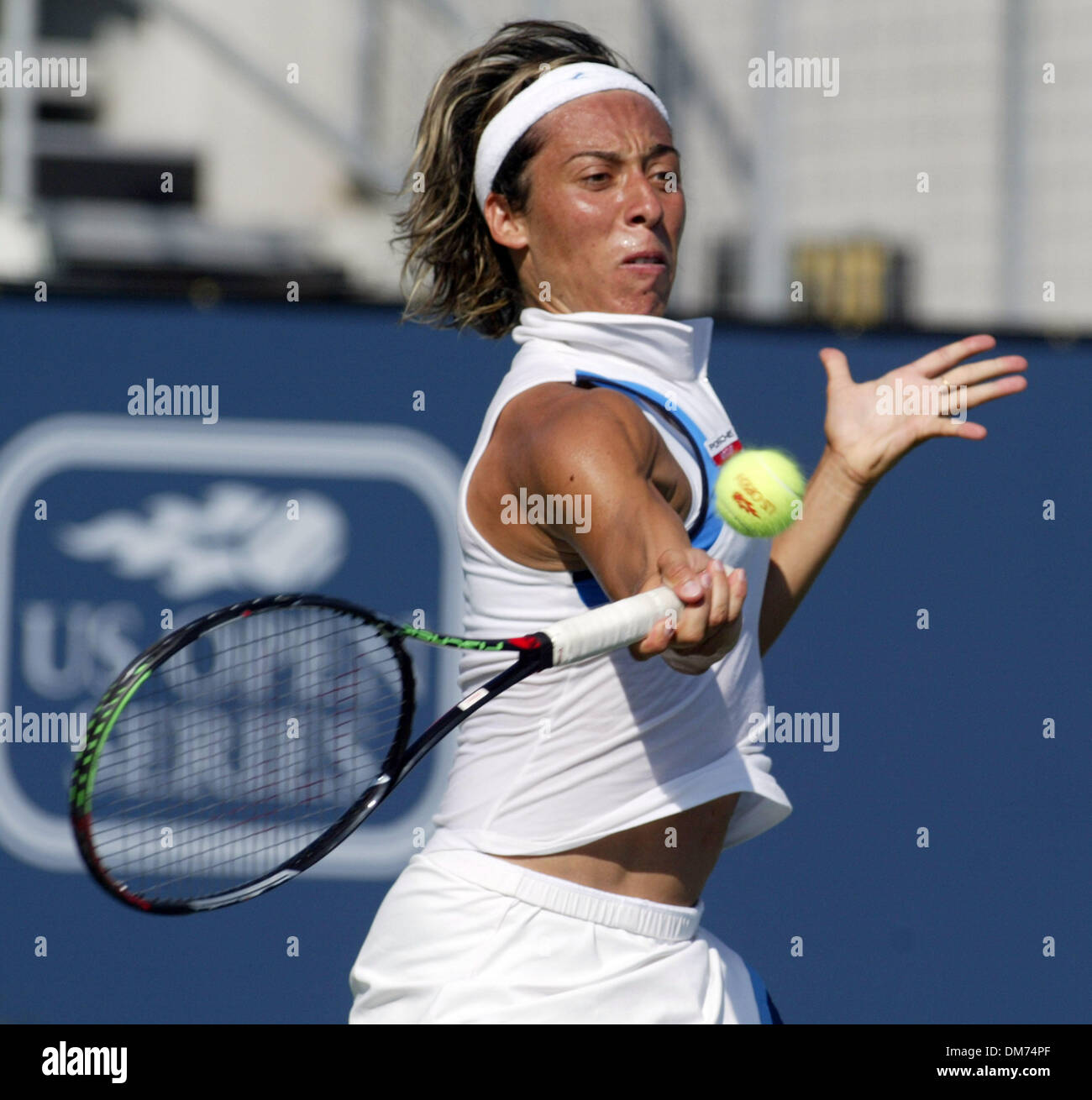 Aug 12, 2005; Carson, CA, USA; FRANCESCA SCHIAVONE of Italy makes a return to Conchita Martinez of Spain during the quarter final match at the JP Morgan Chase Open in Carson, CA on Aug. 12, 2005. Mandatory Credit: Photo by Armando Arorizo/ZUMA Press. (©) Copyright 2005 by Armando Arorizo Stock Photo