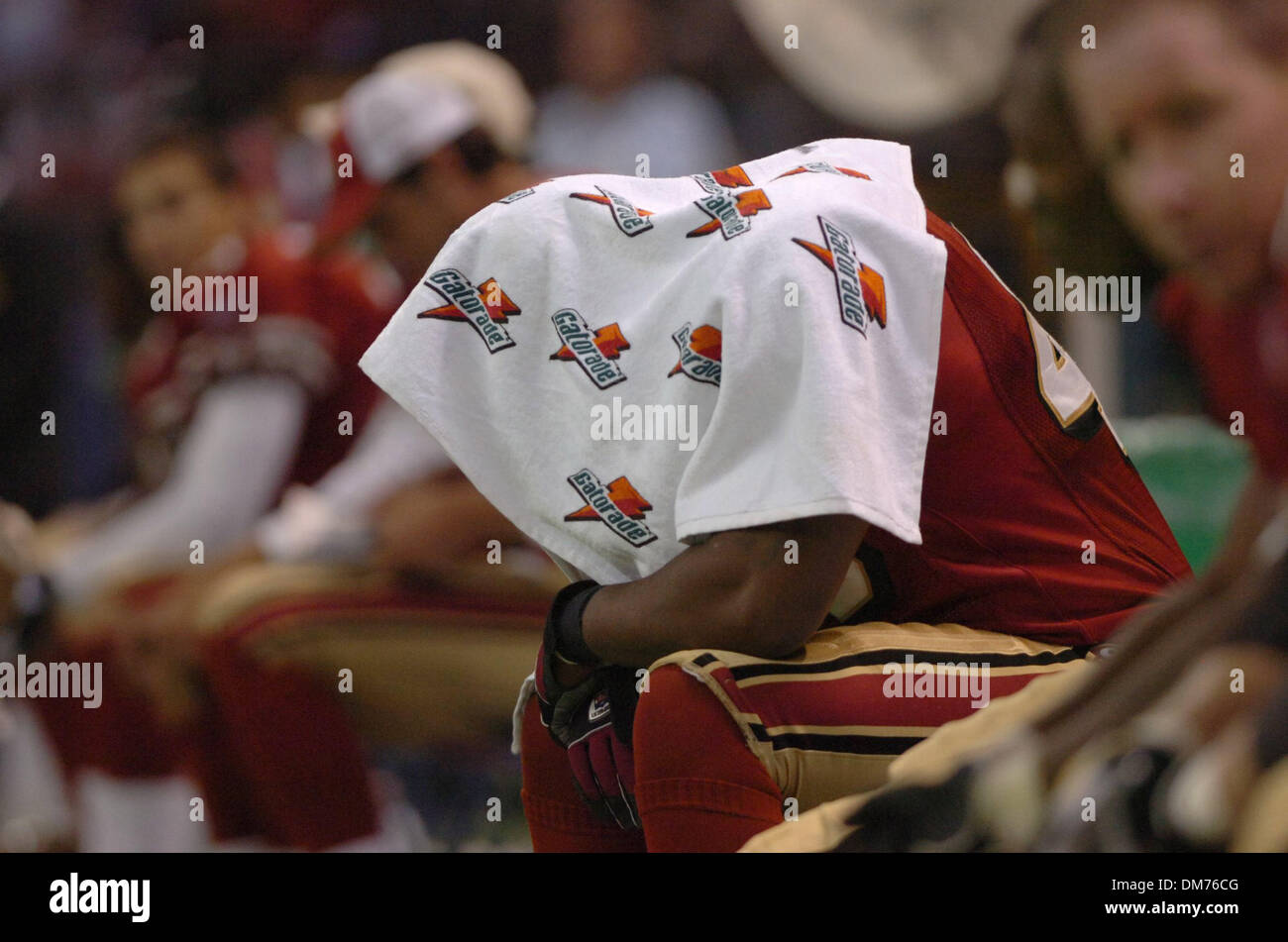 Oct 02, 2005; Mexico City, MEXICO; NFL FOOTBALL: 49er fullback Fred Beasley finds a quiet space under a towel in the final minutes of Sunday evenings 31-14 loss to the Arizona Cardinals at Estadio Azteca in Mexico City, Mexico. Mandatory Credit: Photo by Jose Luis Villegas/Sacramento Bee/ZUMA Press. (©) Copyright 2005 by Jose Luis Villegas/Sacramento Bee Stock Photo