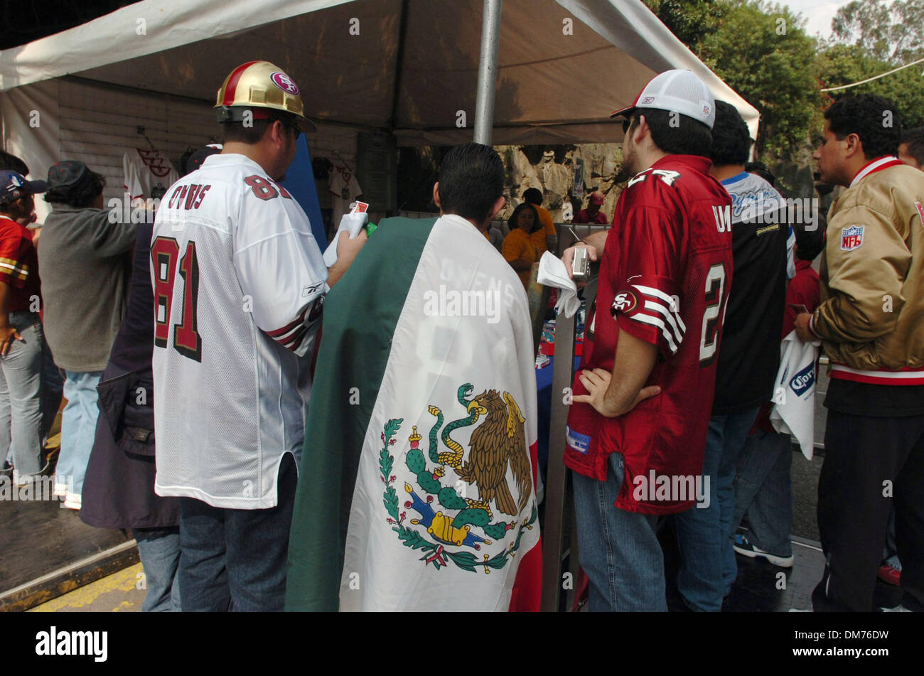 Oct 02, 2005; Mexico City, MEXICO; NFL FOOTBALL: Angel Sepulveda (cq-center-age 21), flanked by Jesus Guerra (cq-right age 21) and Cesar Balderas (cq-left age 23) all from Hadensburg, Texas look over souvenirs Sunday afternoon before the San Francisco 49ers and Arizona Cardinals play at Estadio Azteca in Mexico City. Mandatory Credit: Photo by Jose Luis Villegas/Sacramento Bee/ZUMA Stock Photo