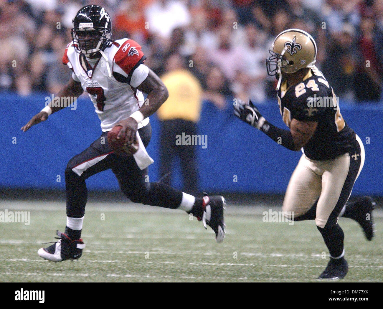 Oct 16, 2005; San Antonio, TX, USA; NFL FOOTBALL: Atlanta Falcons vs New  Orleans Saints. Falcons' Michael Vick runs from the Saints' Dwight Smith at  the Alamodome. The Falcons went on to