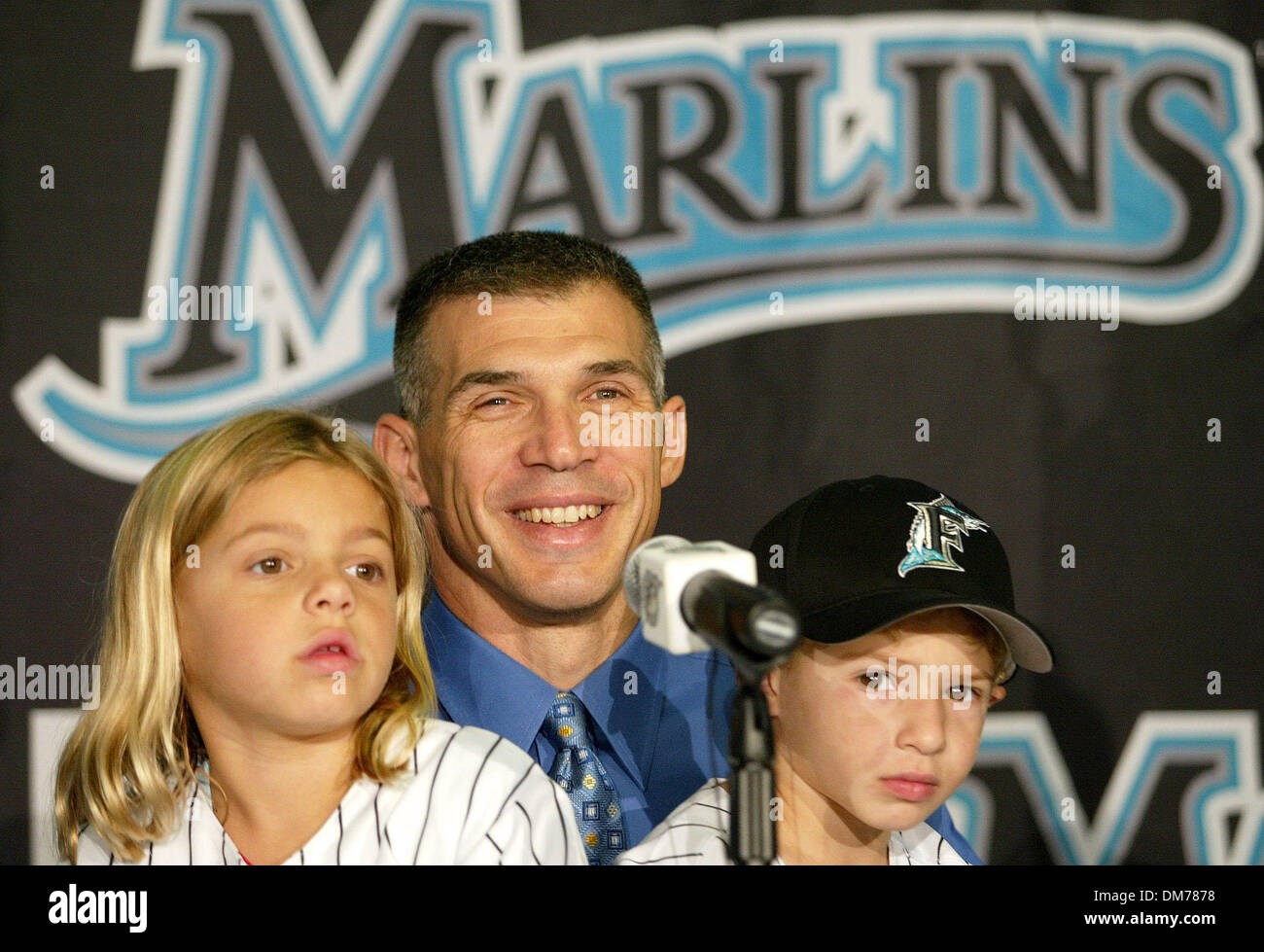 Oct 20, 2005; Miami, FL, USA; New Florida Marlins Manager Joe Girardi, with  his daughter Serena, (cq), 6, (L), and son Dante, 3, during dads press  conference Thursday afternoon at Dolphins Stadium.