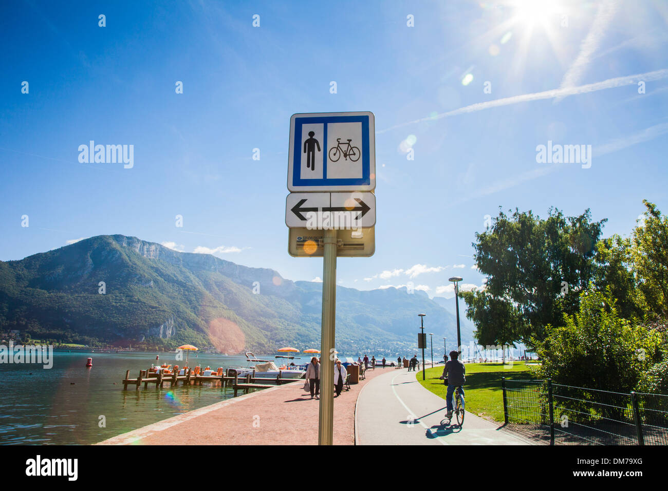 Sign showing pedestrian and cycle paths around Lake Annecy, Savoie, France Stock Photo