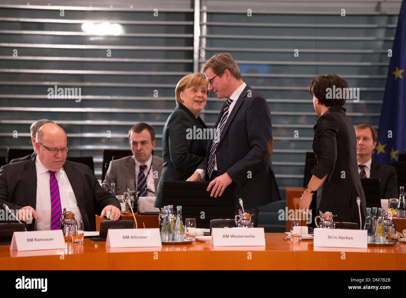 Berlin, Germany. December 12th, 2013. Chancellor Merkel and Interior Minister Friedrich meet with the Prime Ministers of the Germany Federal states at the Chancellery in Berlin. / Picture: Angela Merkel, German Chancellor, and Guido Westerwelle, German Foreign Minister. Credit:  Reynaldo Chaib Paganelli/Alamy Live News Stock Photo
