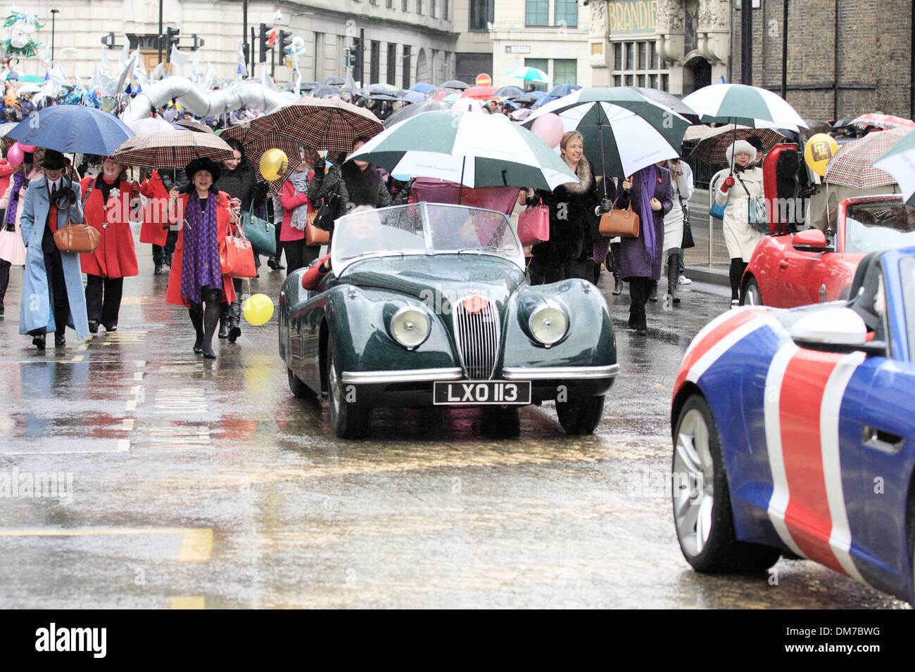 Part of the 'Ladies in the city and Livery'  float taking part in the 2013 Lord Mayor's Show in London on a rainy November day Stock Photo