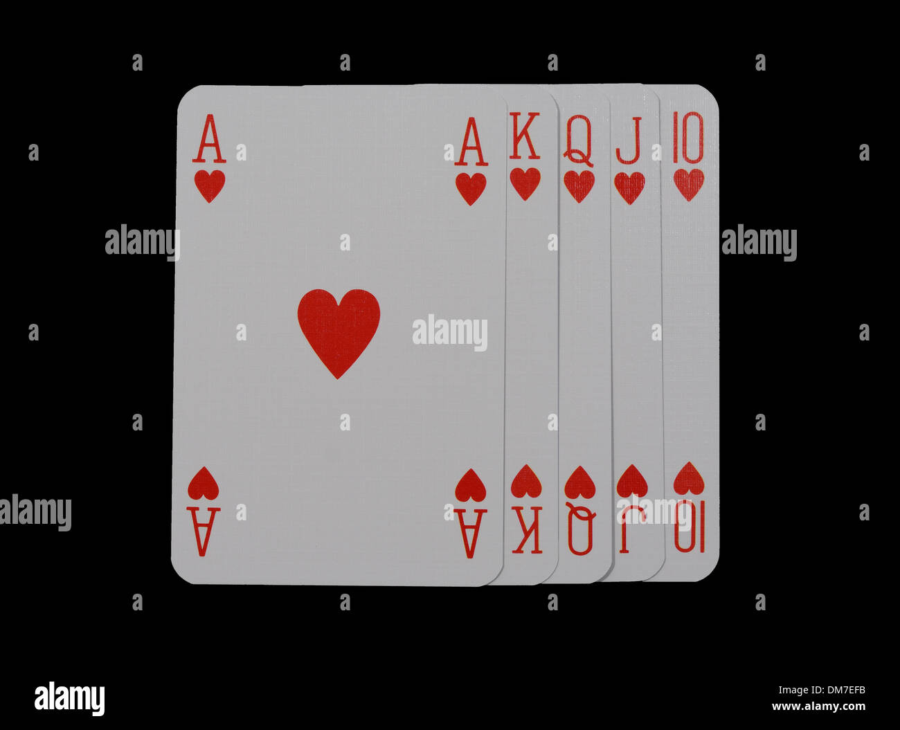 A hand of playing cards showing a royal flush isolated on a studio background Stock Photo