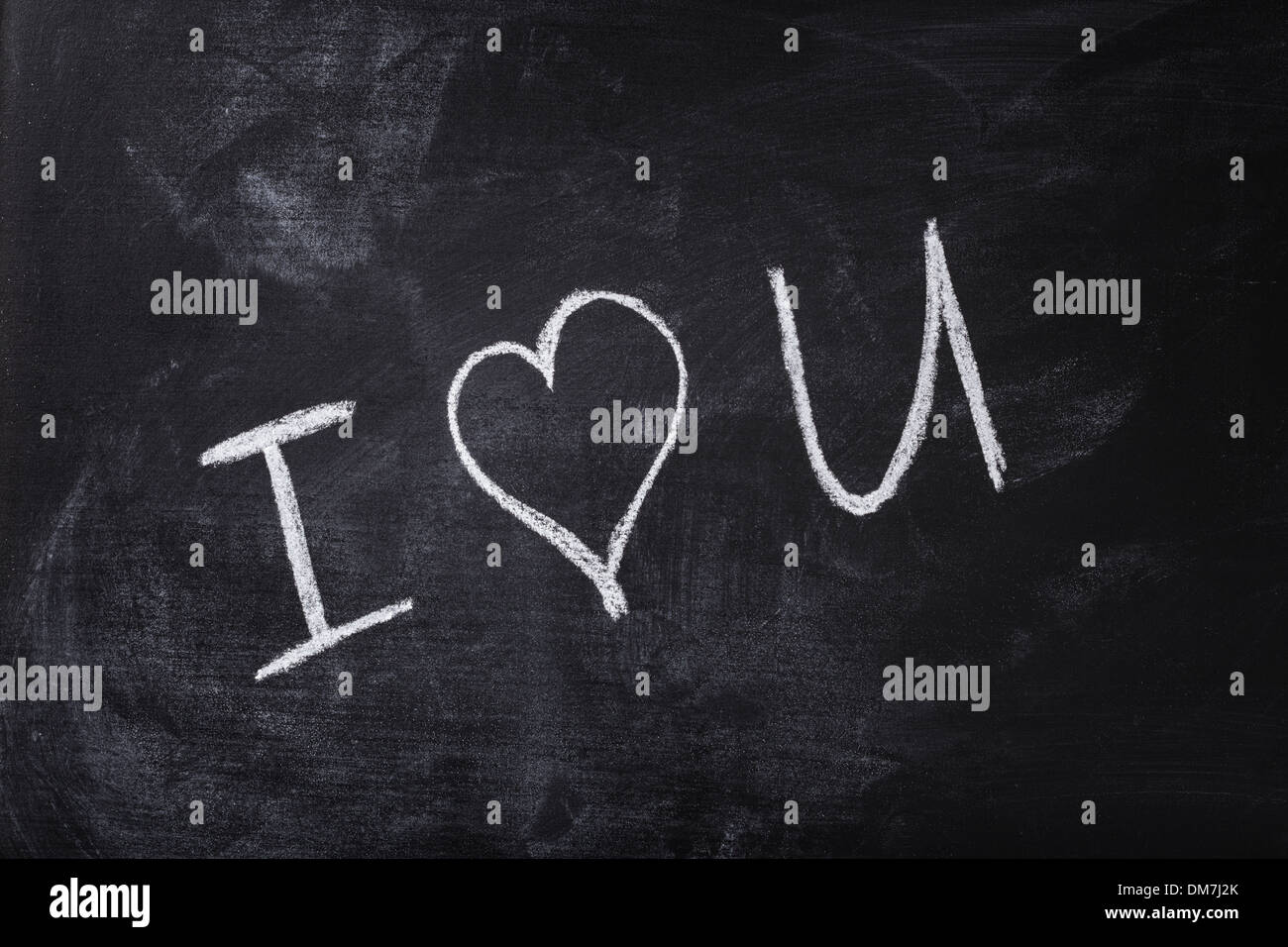 romantic text handwritten on blackboard with chalk, valentines day Stock Photo