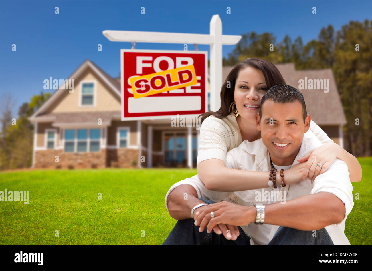Young Happy Hispanic Young Couple in Front of Their New Home and Sold ...