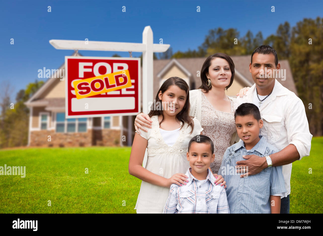 Young Happy Hispanic Young Family in Front of Their New Home and Sold ...