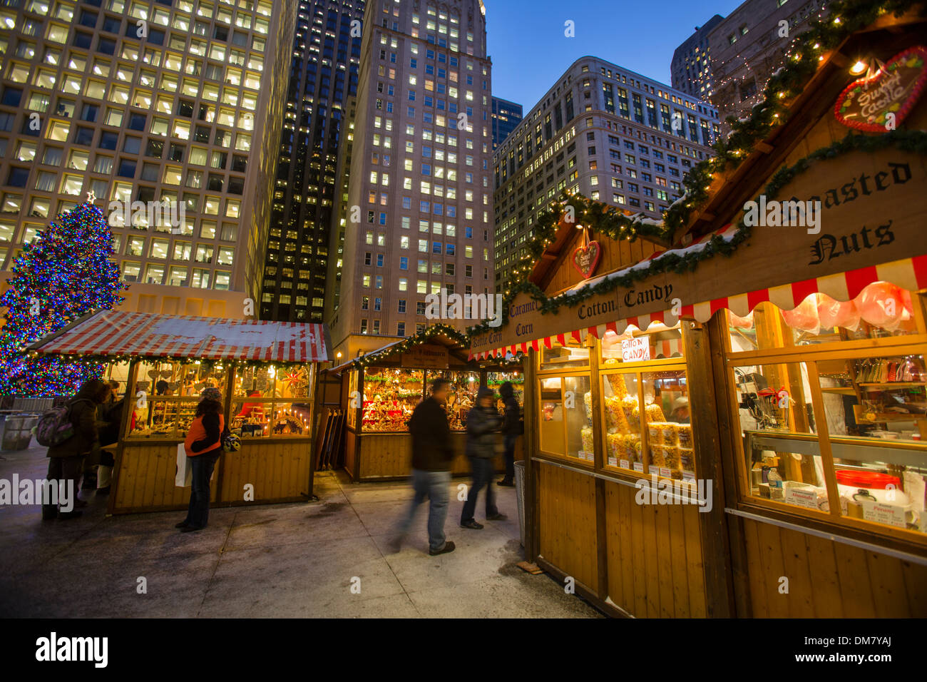 shoppers at Chicago German christkindlmarket winter festival open air outdoor holiday season