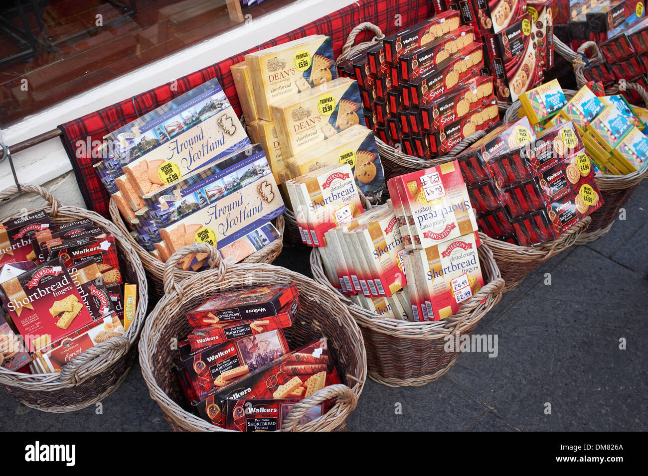 Packets of shortbread biscuits for sale outside a tourist shop in Edinburgh city centre Stock Photo