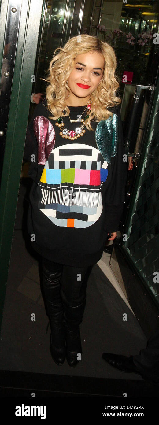Rita Ora leaves Ivy Club wearing a television test card printed top after promoting her new album at Whiteleys London England - Stock Photo