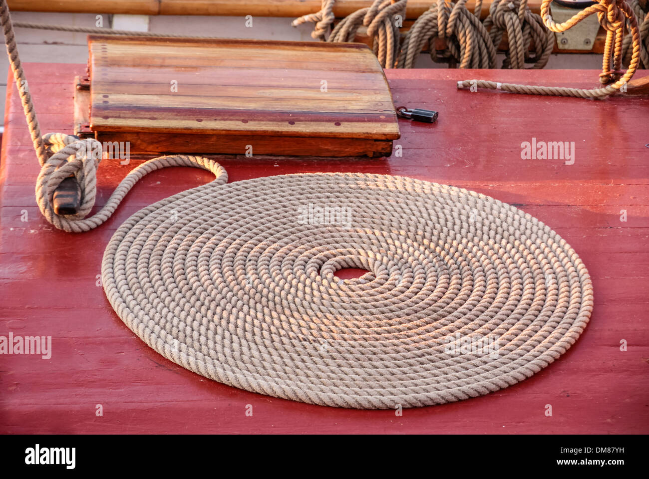 Coiled rope on the deck of an old sailing ship in Nyhavn in Copenhagen ...
